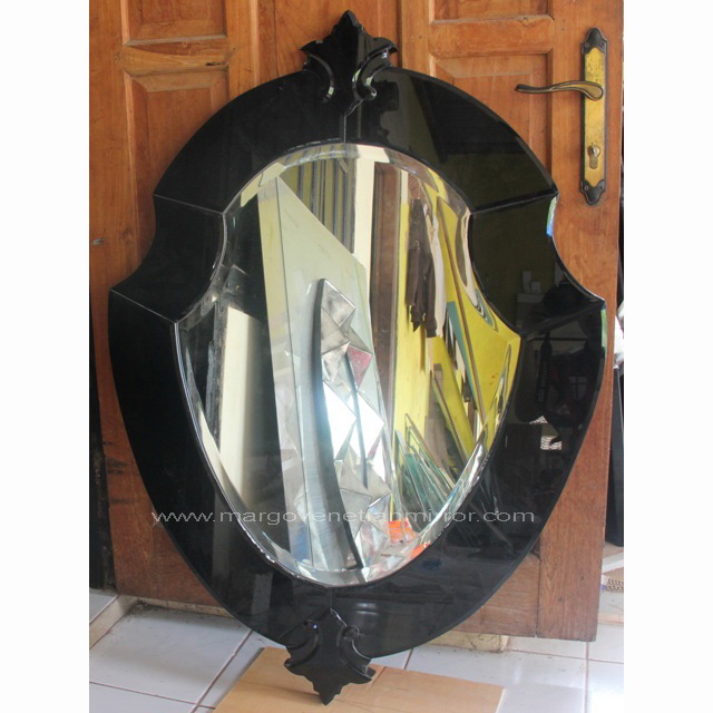 An Luxurious Black Venetian Mirror