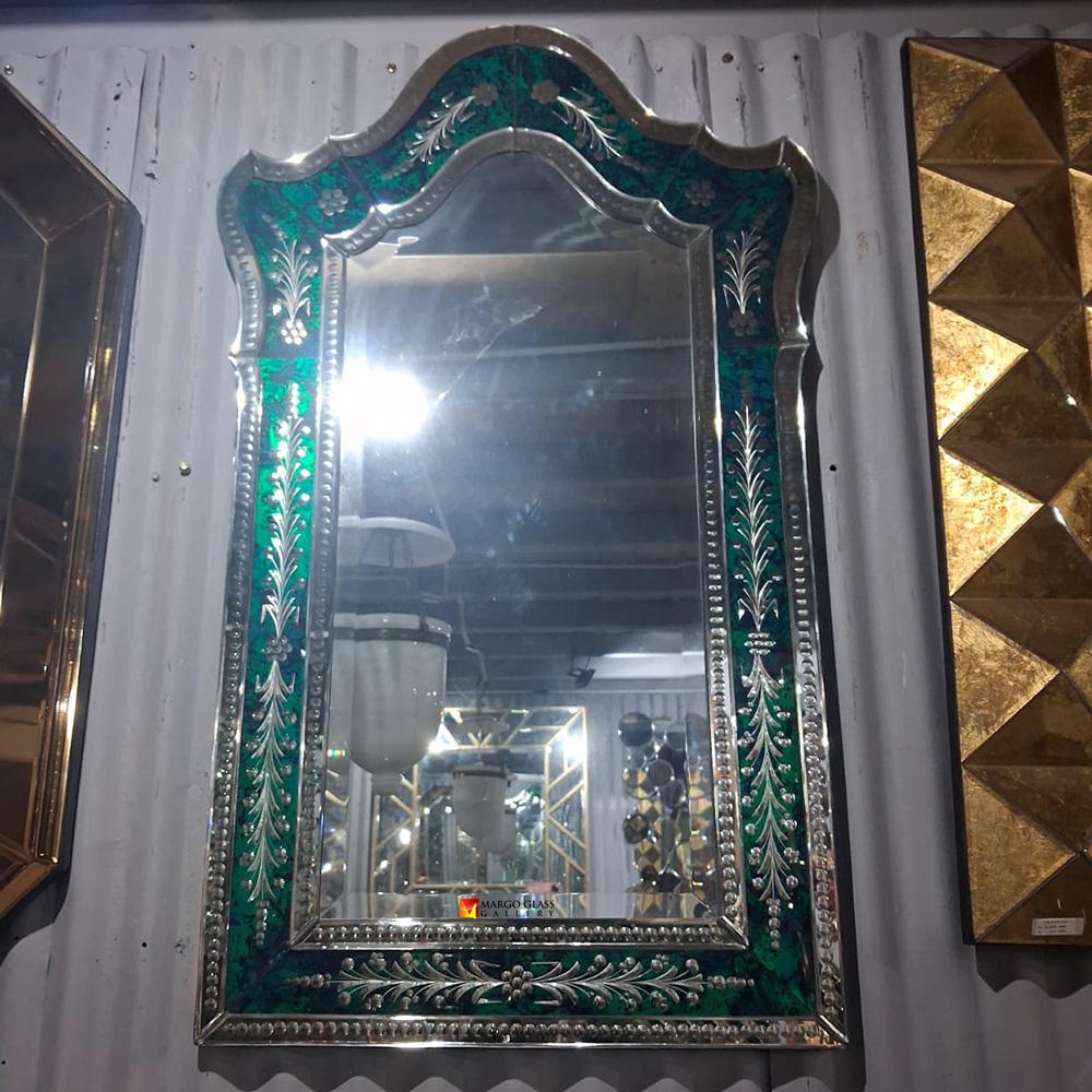 Green Venetian Mirror Shapes the Identity of an Emerald House